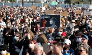 Protesters at a Black Lives Matter rally at Langley Park in Perth. The protest was organised to raise awareness of Aboriginal deaths in police custody