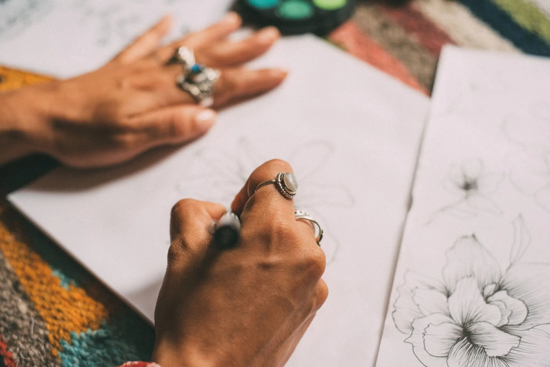 An individual making sketches