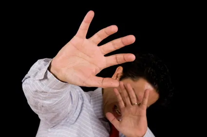 a picture of a man showing an emotion of fear of seeing man or women